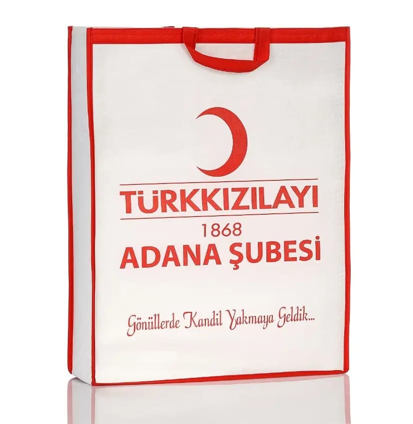 promosyon beyaz tela çanta, kırmızı biyeli, sap ve belediye logosu baskılı