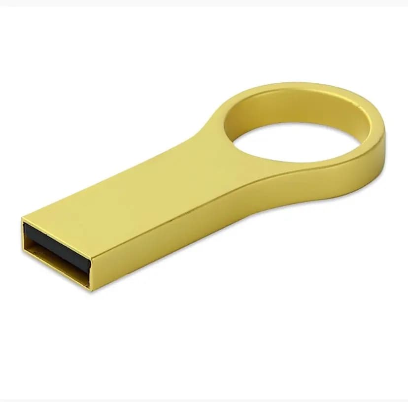 promosyon altın renkli metal USB bellek, halka tutamaklı gövde, ucunda siyah bağlantı, beyaz zemin