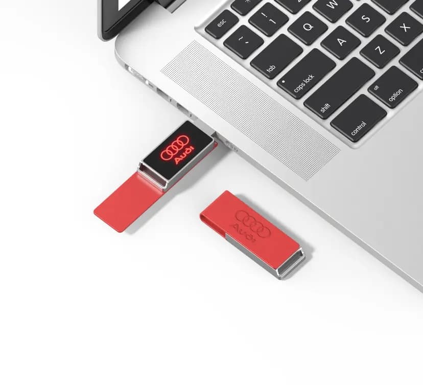 promosyon kırmızı deri kapaklı USB bellek, dizüstü bilgisayarda ışıklı logo baskılı