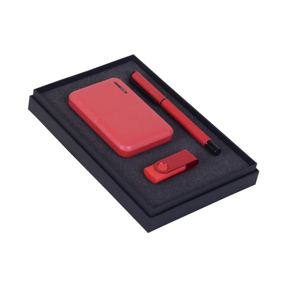 Kırmızı renkli, plastik dış yüzeye sahip powerbank, metal tükenmez kalem ve USB bellek içeren VIP promosyon hediye seti.