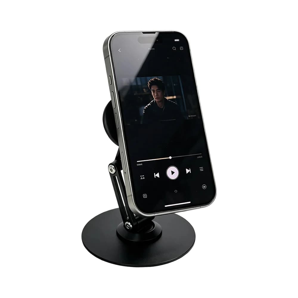 Siyah yuvarlak tabanlı manyetik stand, dikey telefon tutuyor