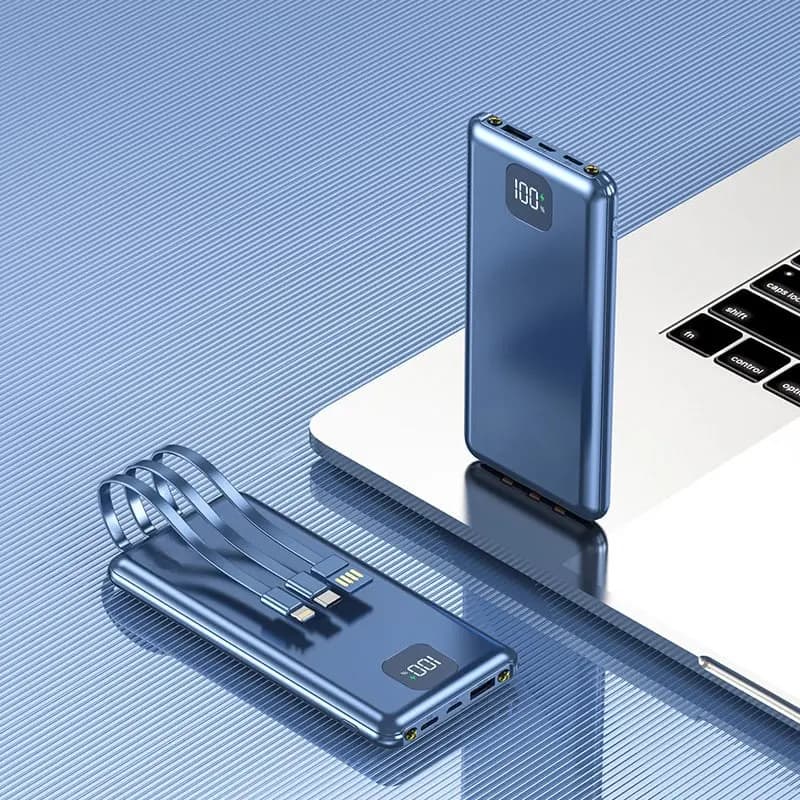 Promosyon mavi powerbank, laptop üzerinde ve yanında kablosuz olarak dizayn edilmiş